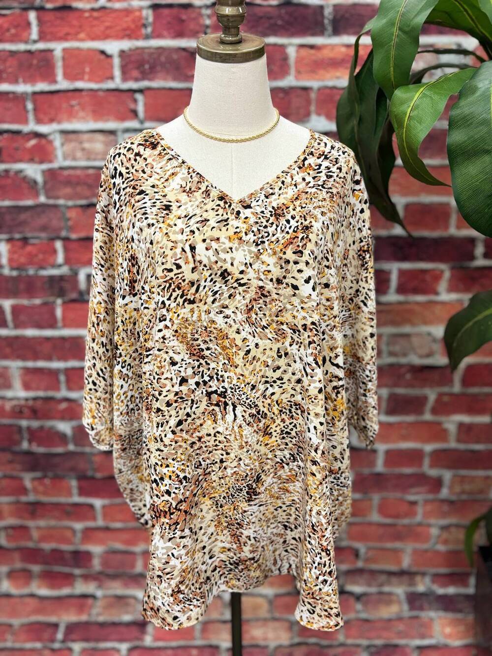 NEW SPIN women's oversized v-neck top in golden safari